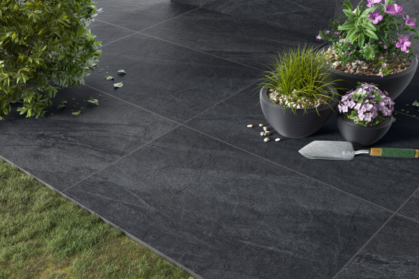 Black Porcelain paving 600X900 used to create a patio paving area