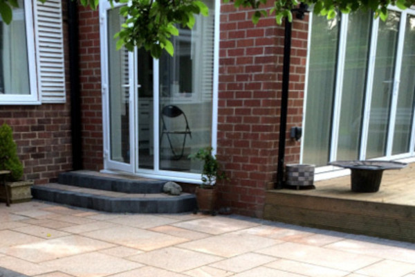 Brown granite paving used on a patio area