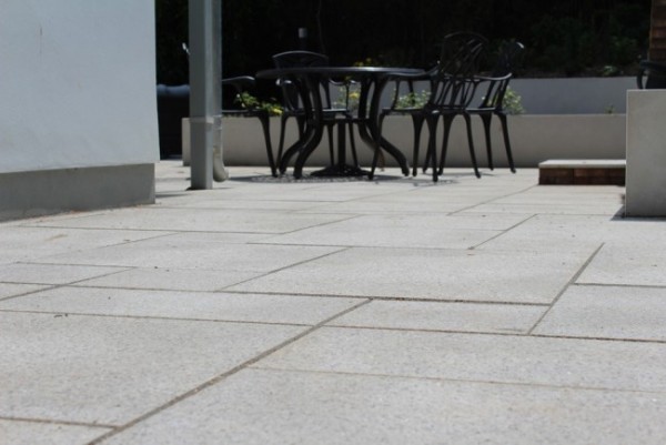 Close up of brown granite patio paving 