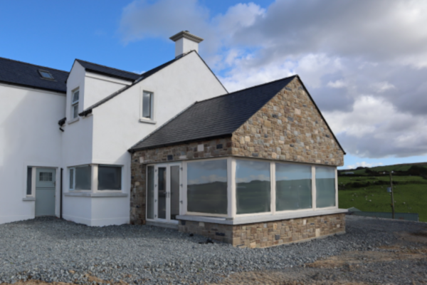 Brown sandstone walling stone used to face a house