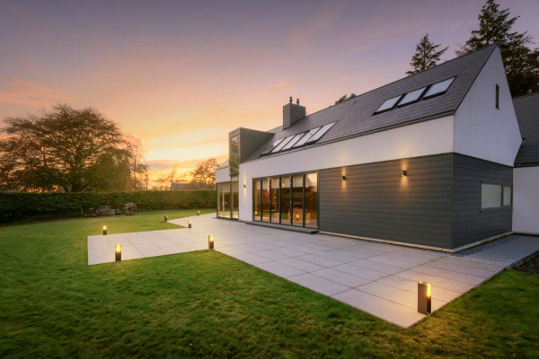 Dark grey granite paving slabs used to create this patio paving area