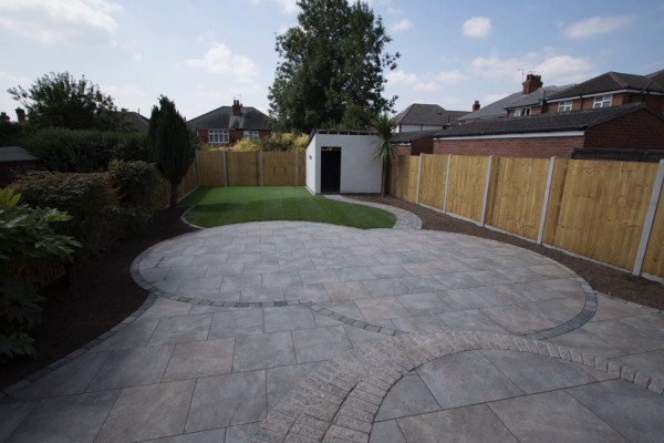 Heritage brown porcelain paving used to create this patio