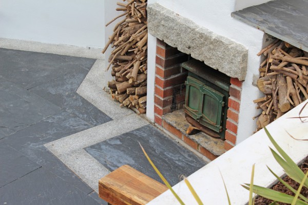 Patio paving slabs used to create a fireplace 