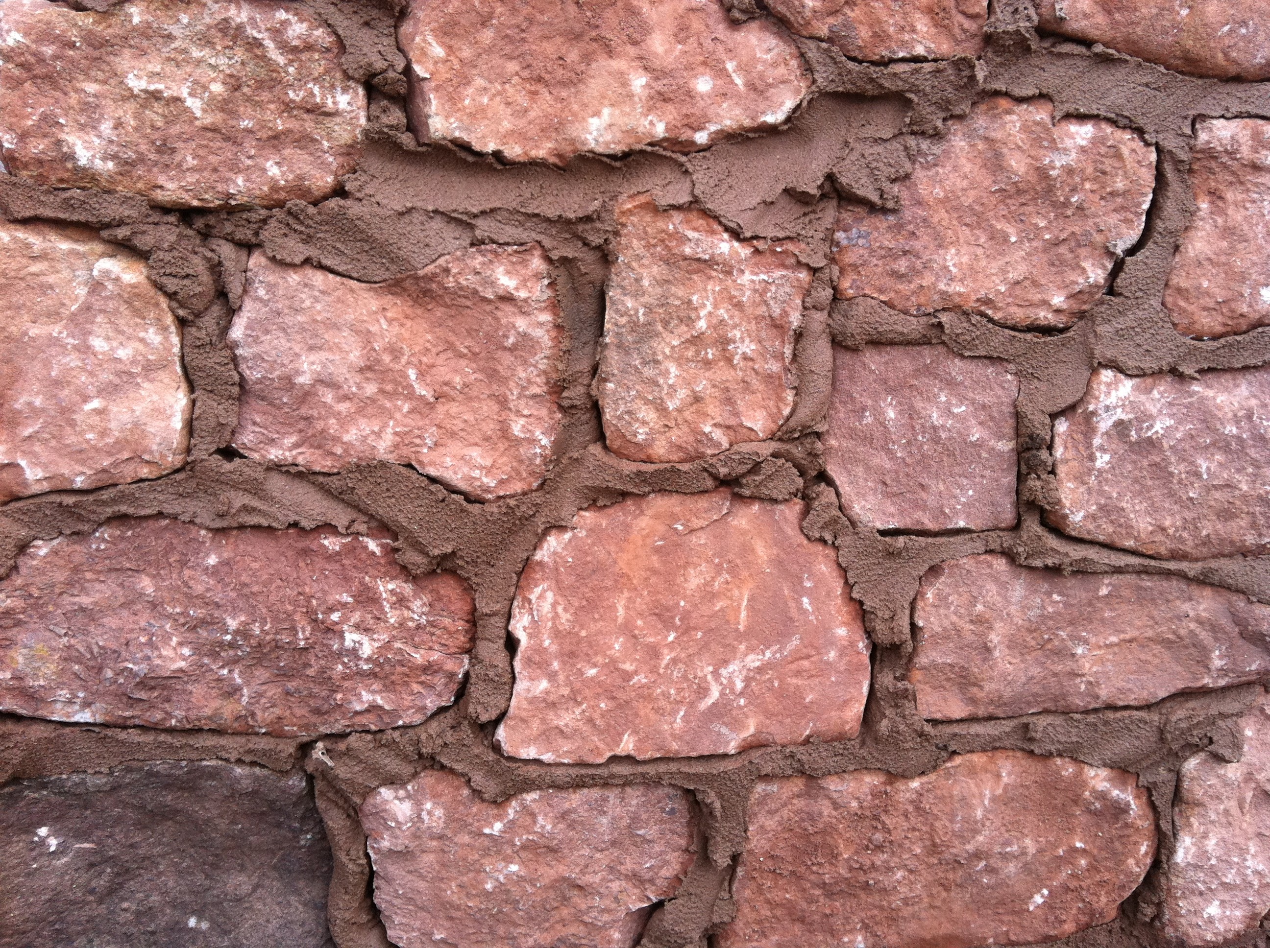 Red sandstone walling close up