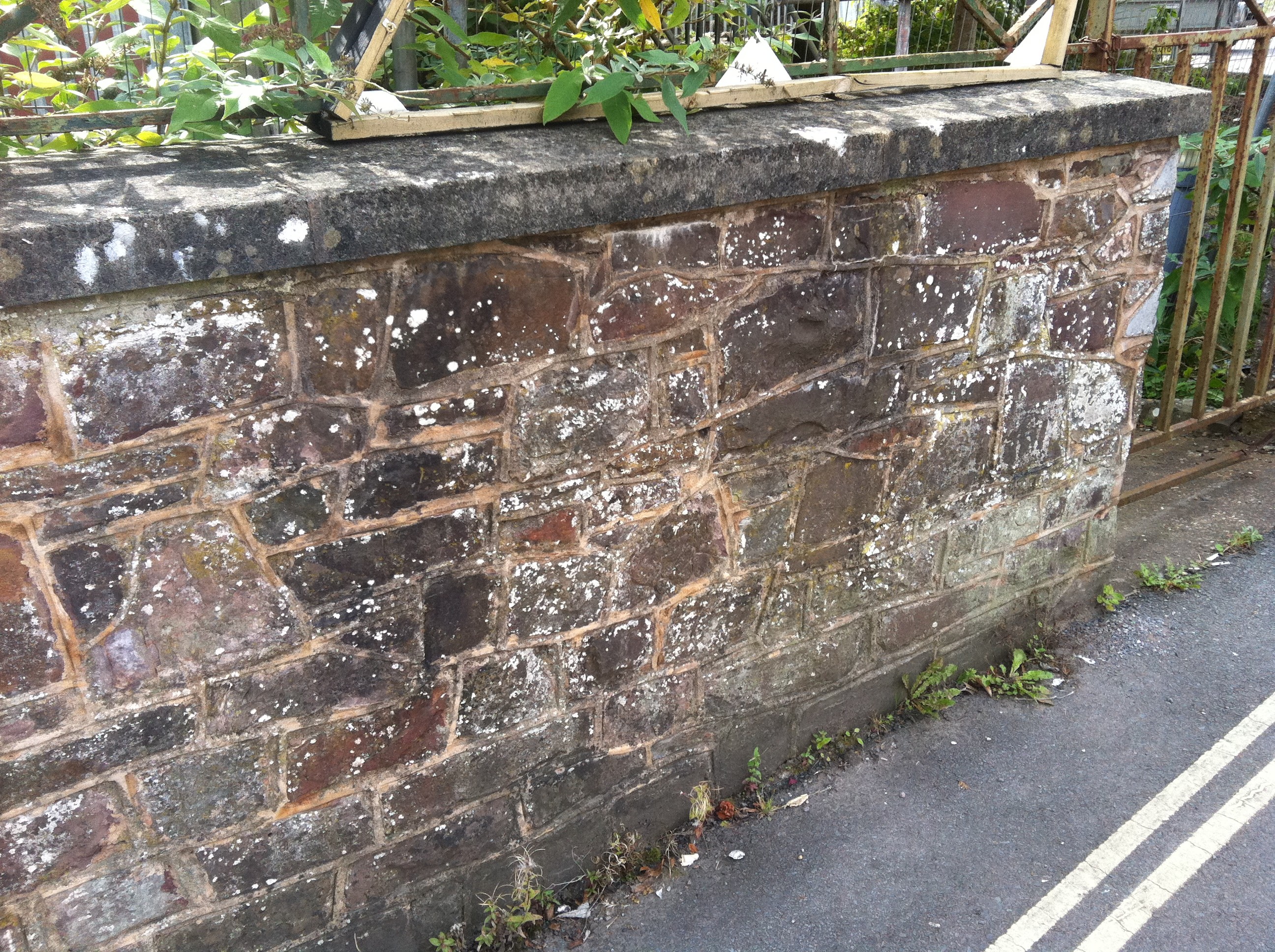 Red sandstone walling used to create a wall