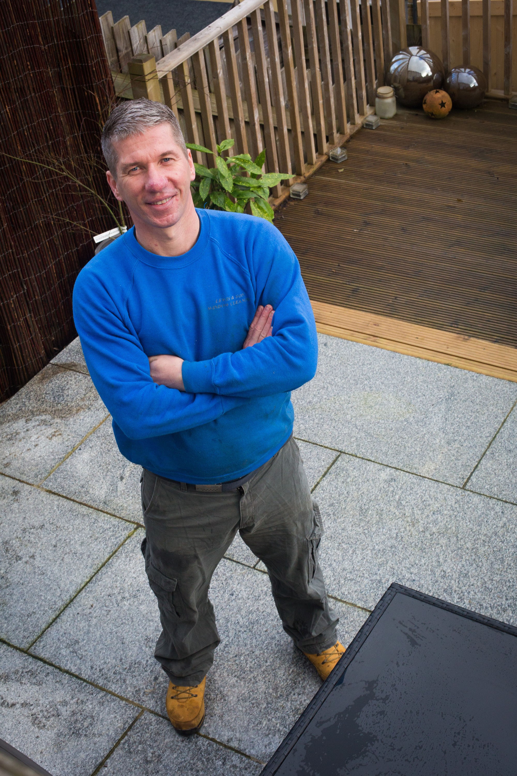A patio created out of ther silver grey granite paving slabs 