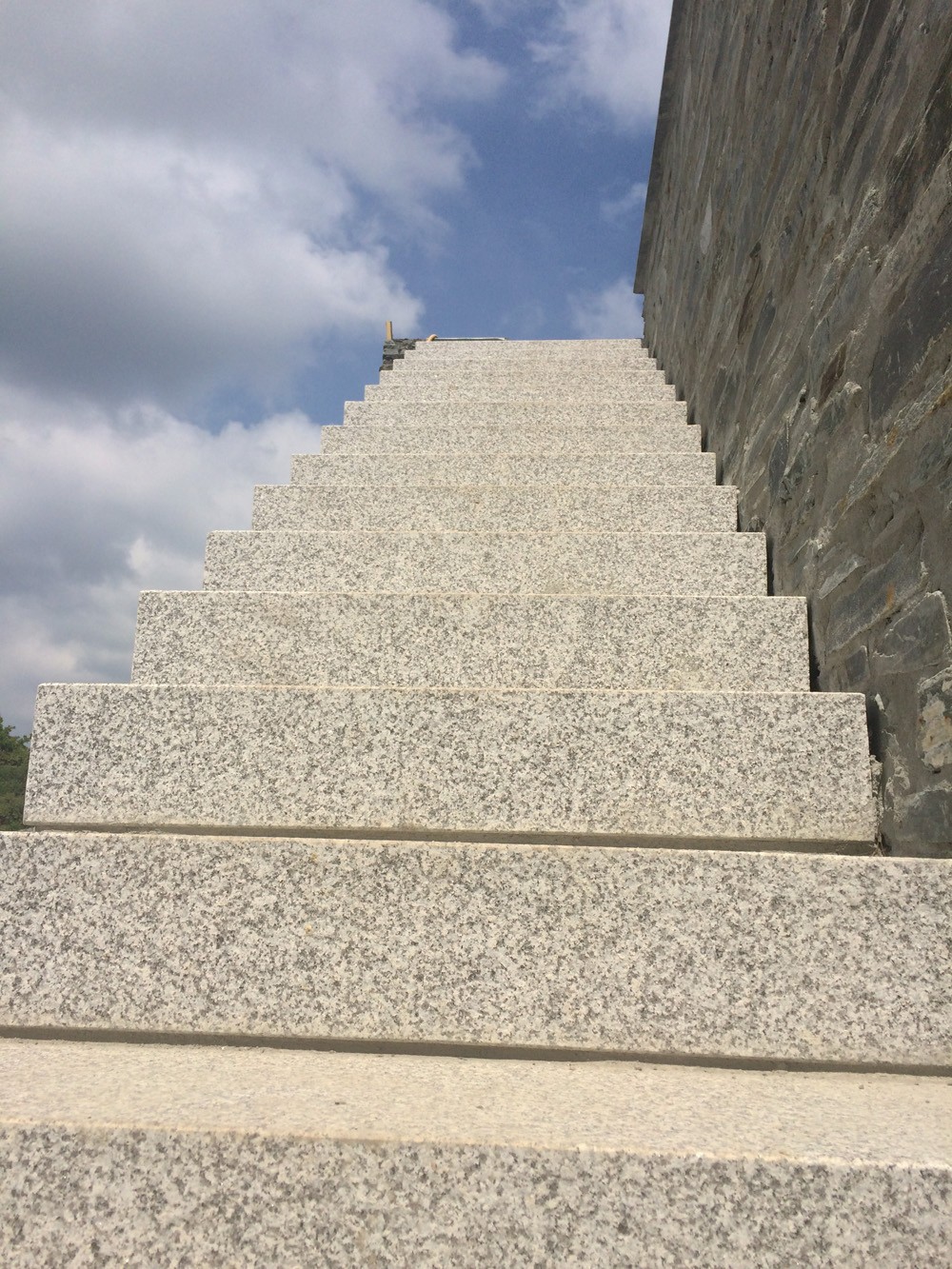 Installed silver grey granite steps