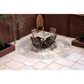 Brown sandstone paving slabs used to create this patio seating area