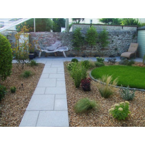 Granite paving slabs 900 x 600 featured in garden