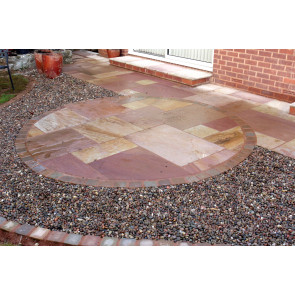 Red sandstone paving slabs used to create this patio paving area