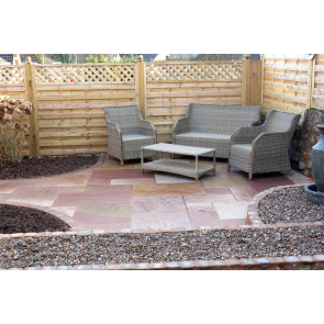 Red sandstone paving slabs used to create a patio paving. 