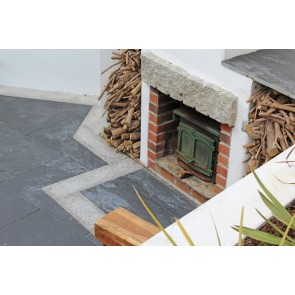 Patio paving slabs used to create a fireplace 