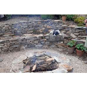 Garden hedging stone to create a drystone flowerbed