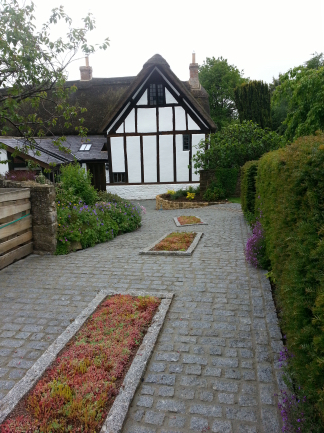 Silver grey granite setts in driveway